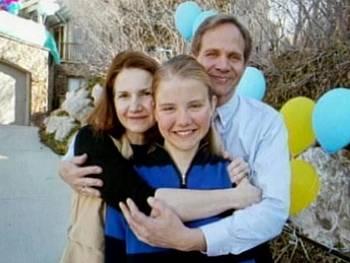 Elizabeth Smart with her father and mother after being reunited.