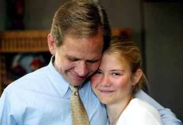 Elizabeth Smart with father, after being rescued.